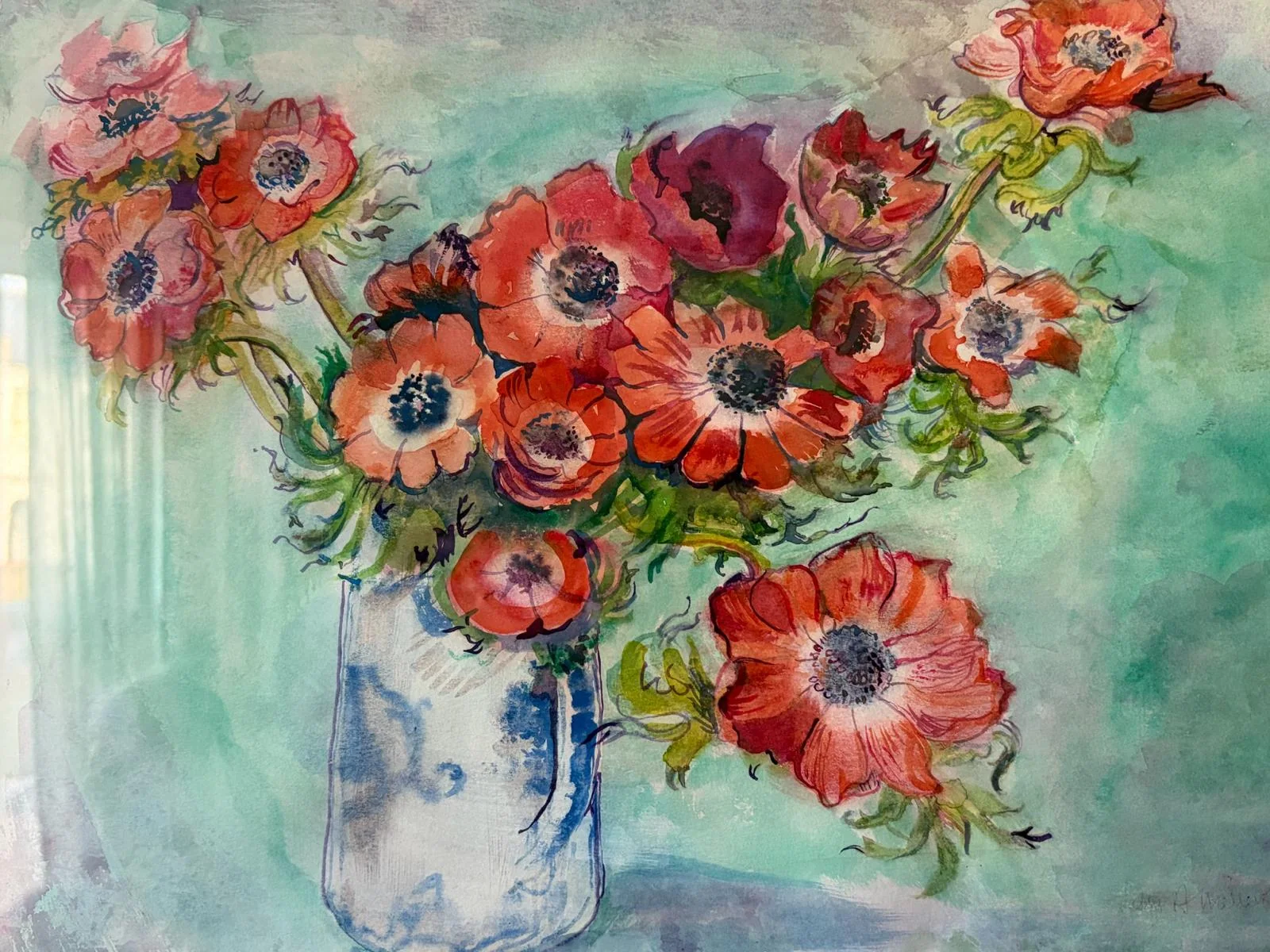 Sally's vibrant coral, pink and red flowers in a blue-and-white vase against turquoise.